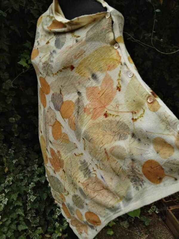 Hand dyed cashmere poncho with imprinted leaves and plants.