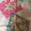 Pink and green hand dyed 100% silk scarf with imprinted plants. Original colorful accessory to complete any outfit.