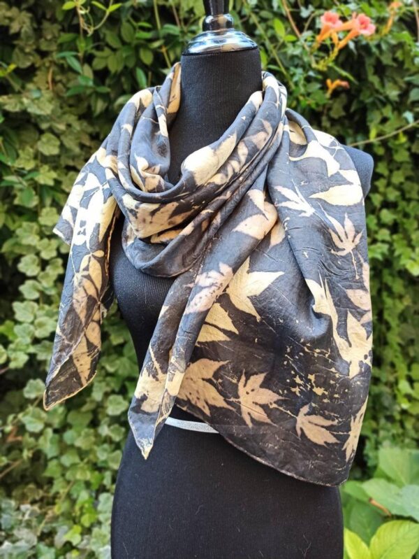 Elegant black ecoprint 100% silk scarf. Leaves and plants impressed on fabric. Ecoprinting and natural dyeing.