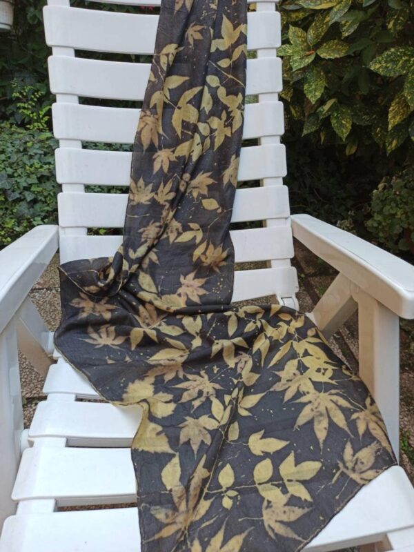 Elegant black ecoprint 100% silk scarf. Leaves and plants impressed on fabric. Ecoprinting and natural dyeing.