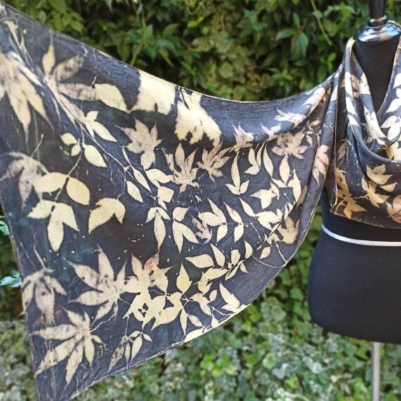 Elegant black ecoprint 100% silk scarf. Leaves and plants impressed on fabric. Ecoprinting and natural dyeing.