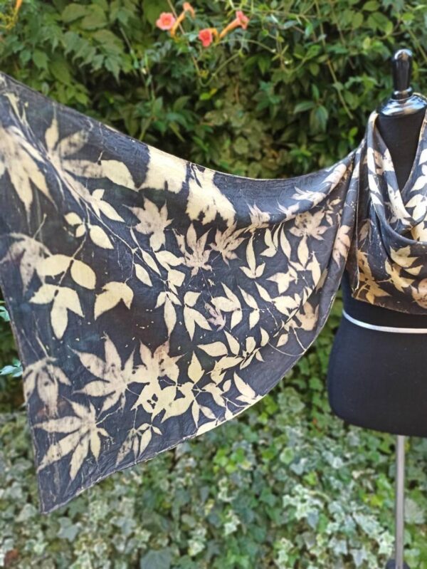 Elegant black ecoprint 100% silk scarf. Leaves and plants impressed on fabric. Ecoprinting and natural dyeing.