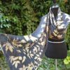 Elegant black ecoprint 100% silk scarf. Leaves and plants impressed on fabric. Ecoprinting and natural dyeing.